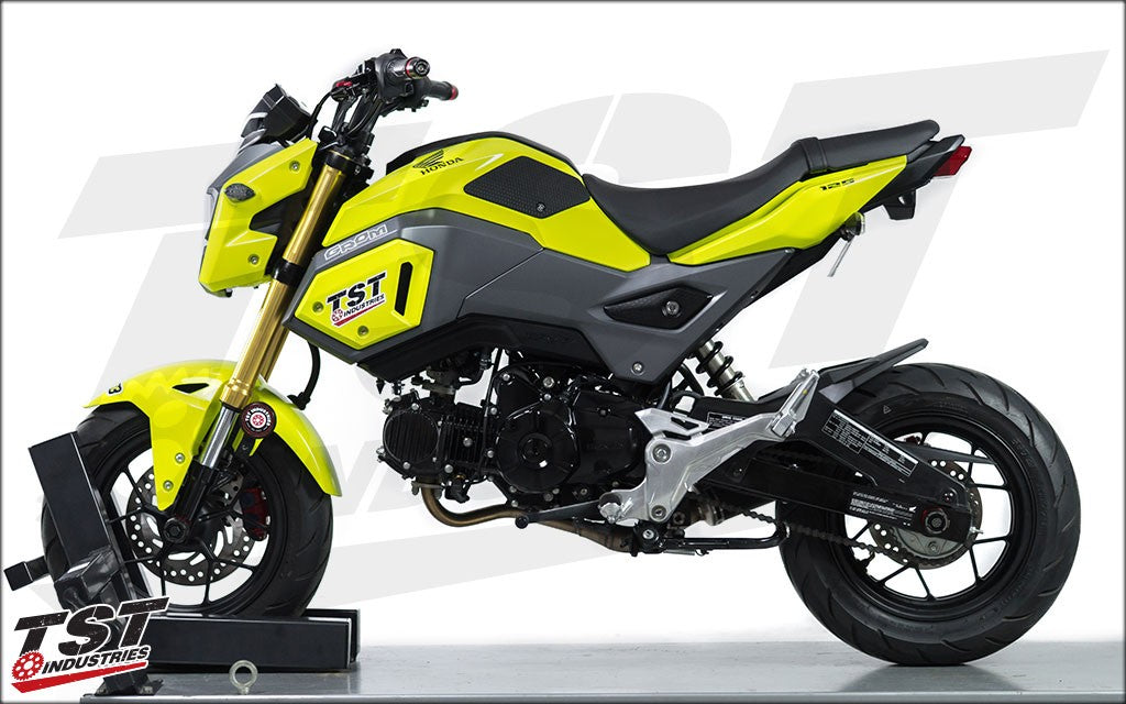 TST Industries Mini-Bike Axle Slider kit installed on the Honda Grom (shown with 2 kits installed).