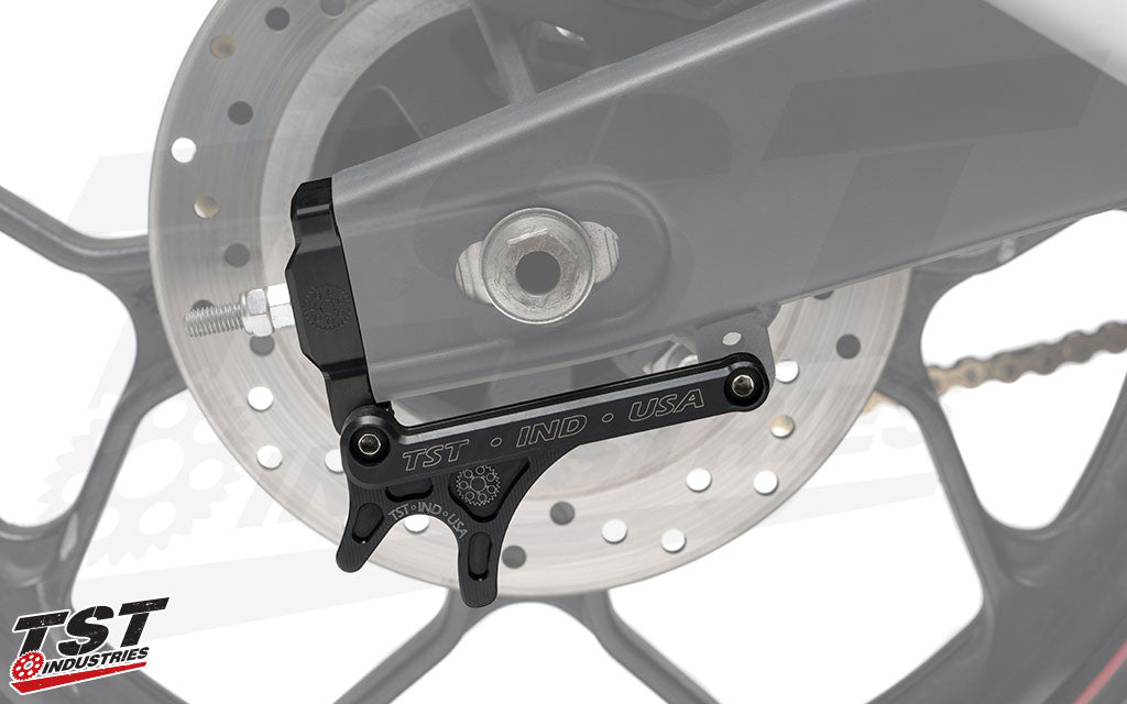 TST Captive Chain Adjuster & GP Lifter Kit installed on a 2015 Yamaha YZF-R3. Shown with optional Delrin Slider Crash Protectors.