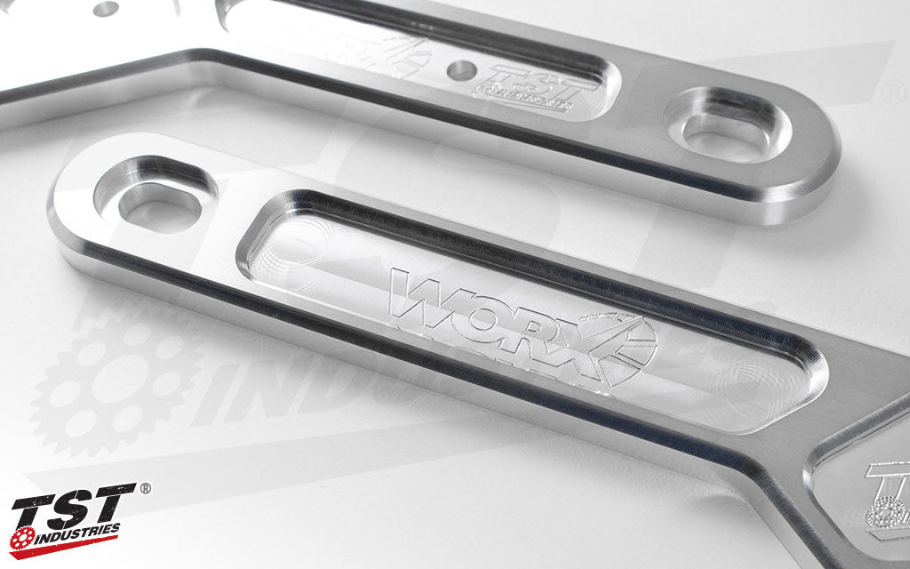 Engraved TST Industries and WORX iconography.