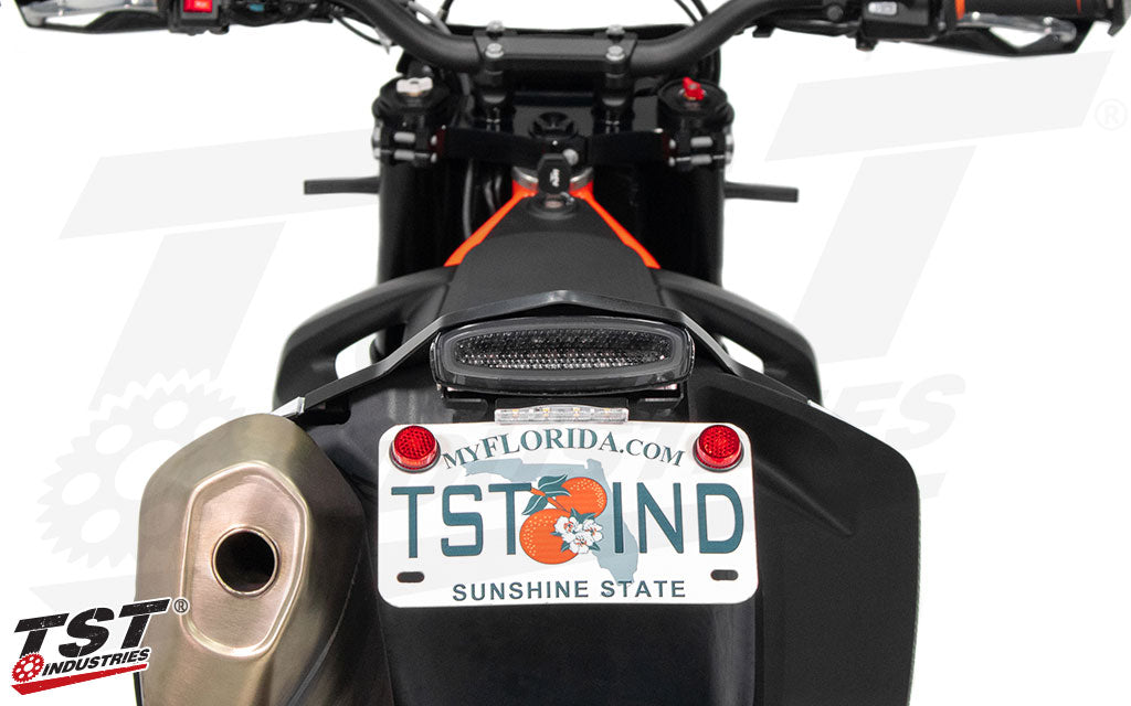 Ducted tail light design accentuates the KTM design language.