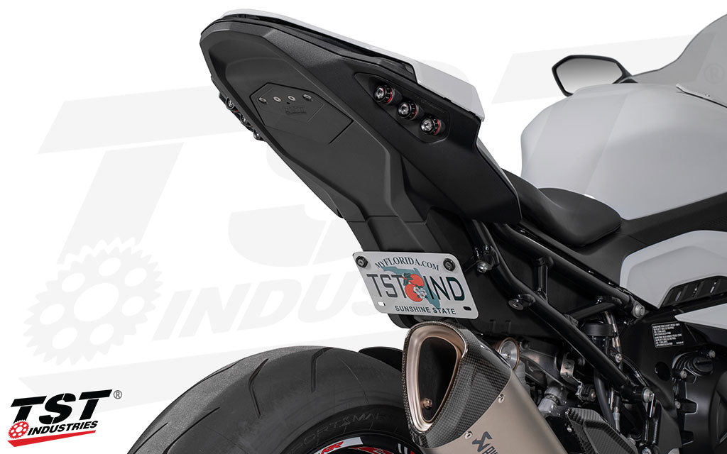 Upgrade your BMW S1000RR / M1000RR by moving the license plate to a tucked, low, and non-distracting location.
