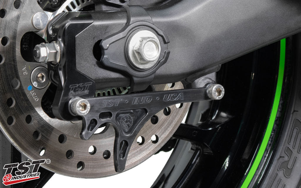 TST Captive Chain Adjuster and GP Lifter System installed on the 2023 Kawasaki ZX-4RR.