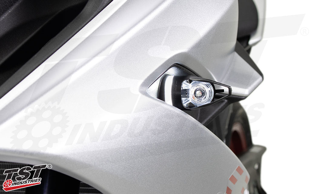 Hyper White running light illuminates the base of the MECH-EVO turn signal.