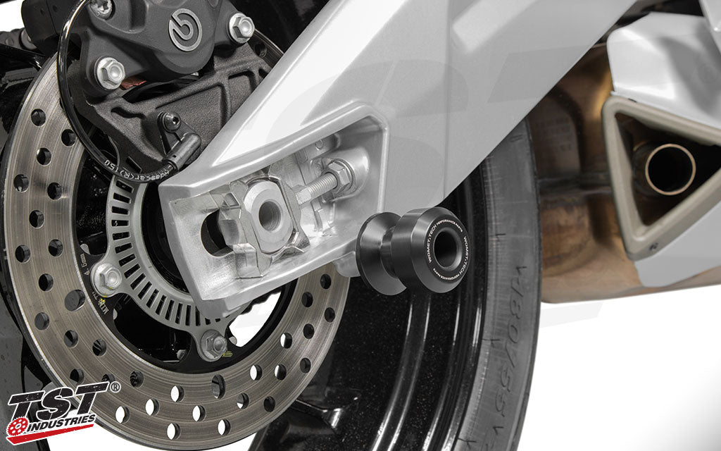 Womet-Tech Swingarm Spool Sliders installed on the Aprilia RS 660.