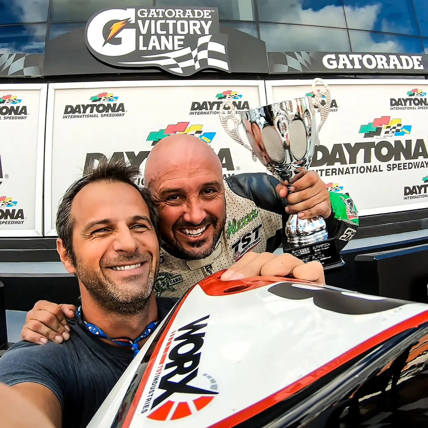Bart Rogowski and Alex Ferreira celebrating their ASRA Moto3 National Championship Win at the Daytona International Speedway.