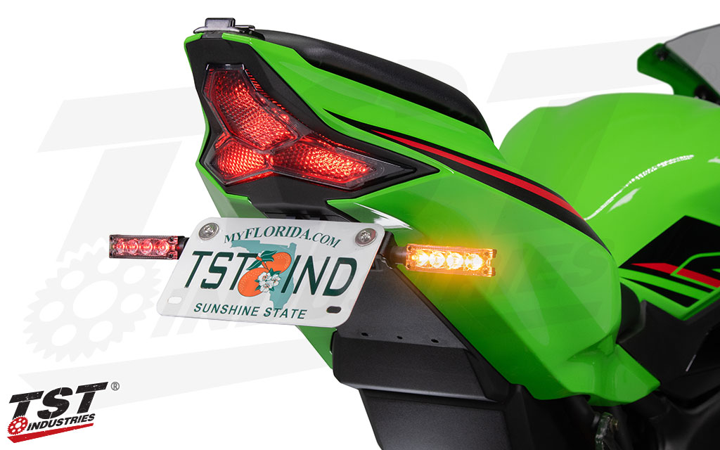 Sequential turn signal feature a scrolling motion, illuminating from the base of the signal outward.