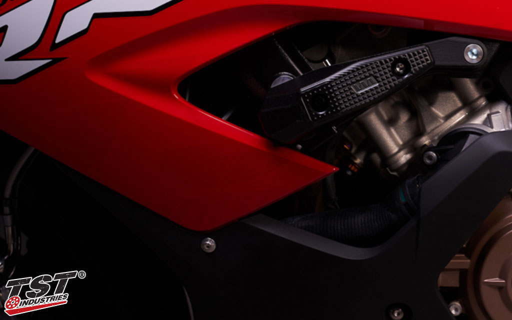 Robust delrin sliders provide initial impact absorption and a consumable sliding surface.