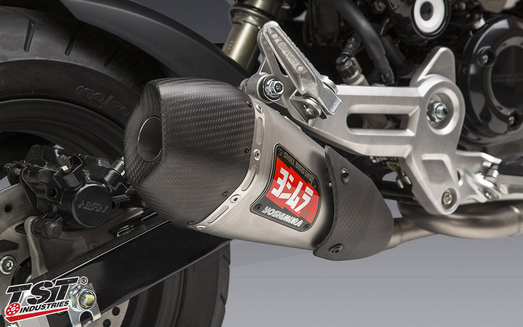 Stainless muffler features carbon fiber end cap and a carbon fiber heat sheild.