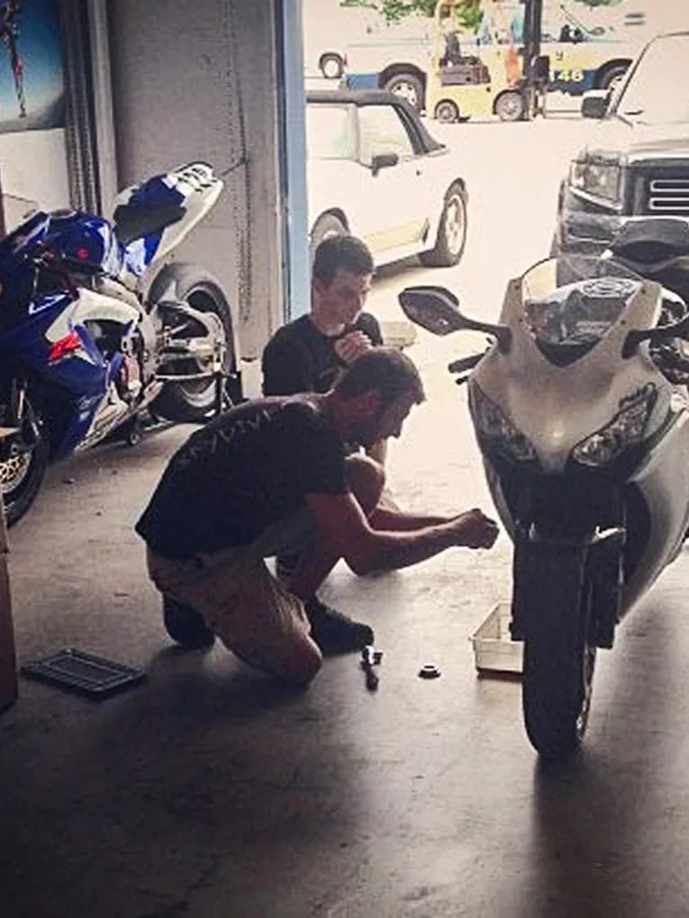 Bart Rogowski and Steven Fox filming installation videos in the early years of TST Industries.