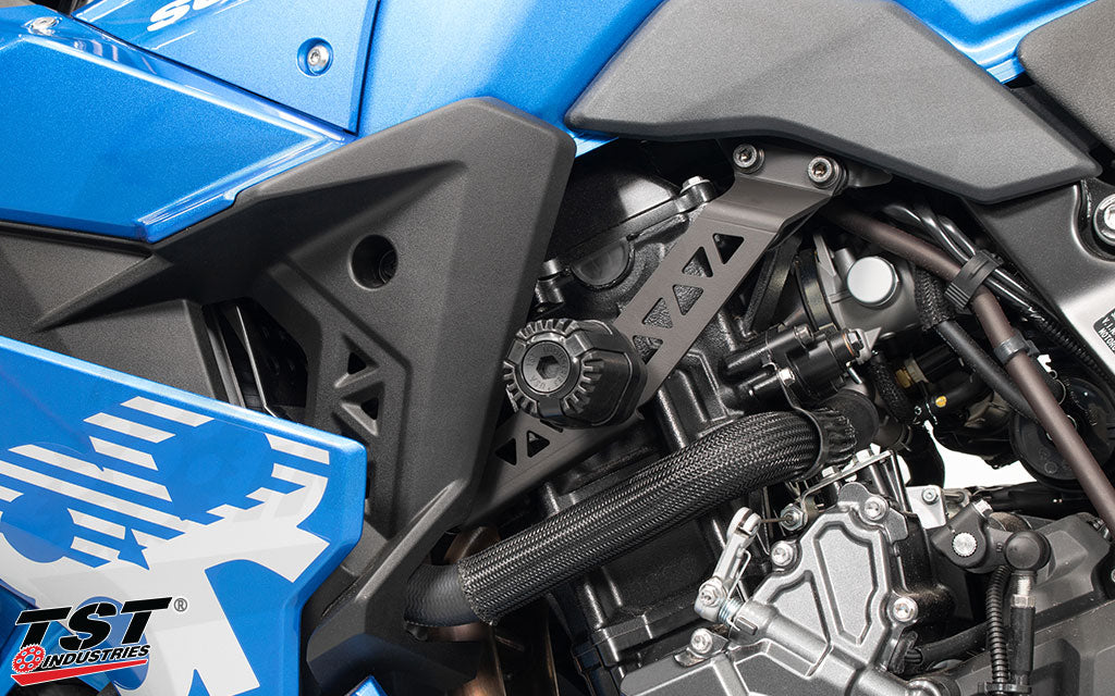 Side angle of the TST Shock Absorbing Frame Sliders installed on a Suzuki GSX-8R.