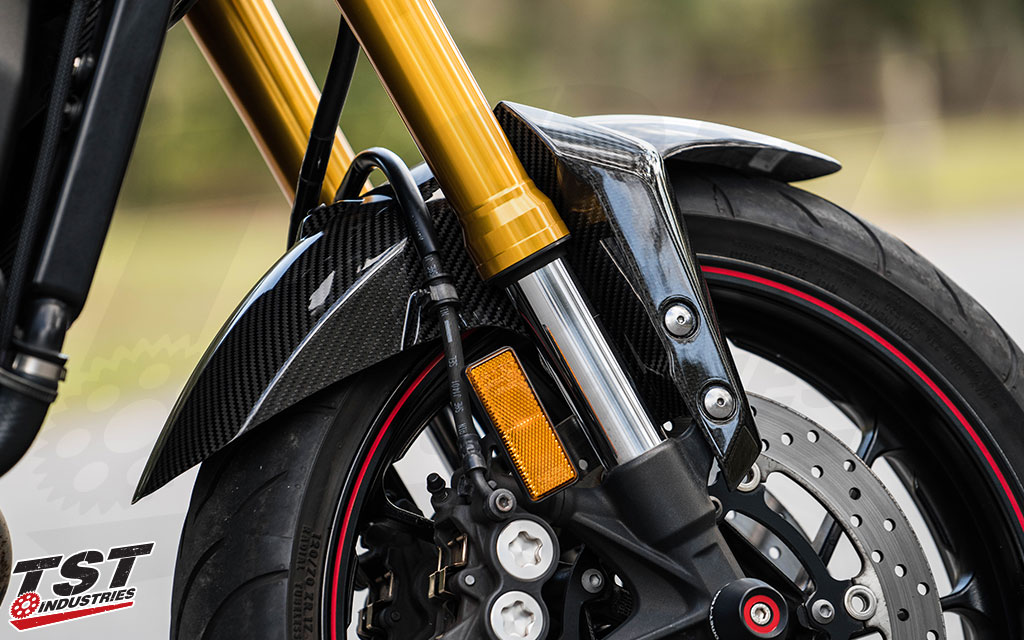 Gain some style points by ditching that OEM plastic and upgrading to carbon fiber.