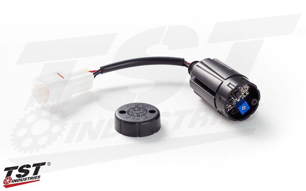 The Brake Light Modulator has a removable cap that enables you to access controls.