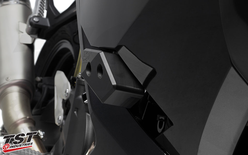 CNC delrin sliders have been specifically designed to fit within the Ninja 400 side fairings.