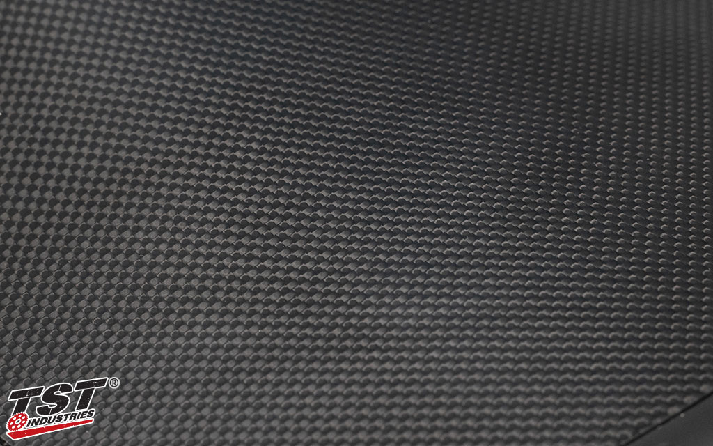 TST plain carbon fiber with a gloss finish.