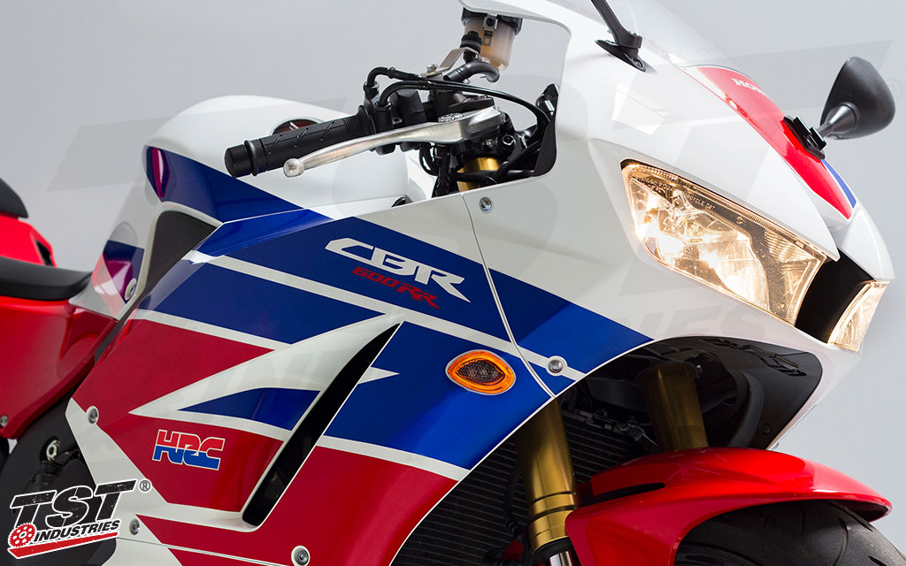 TST LED HALO-1 Flushmount Front Turn Signal with Orange running light on the 2013+ Honda CBR600RR.