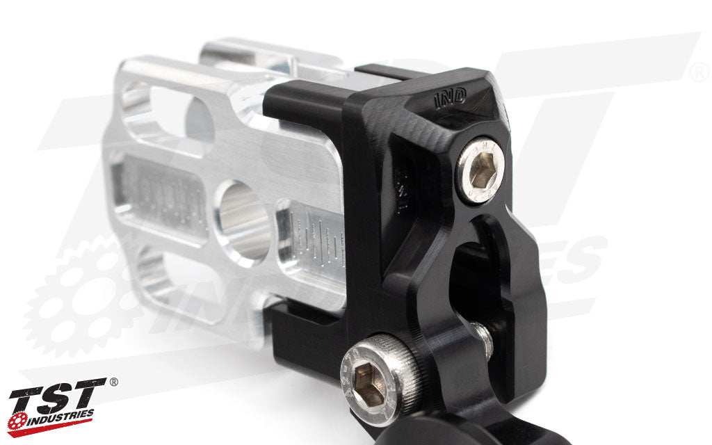 Easy to access adjustment bolt enable precise chain adjustments with predictive measurements.