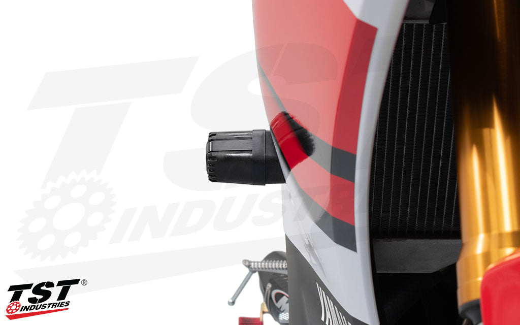 Profile view of the TST Industries Shock Absorbing Frame Sliders installed on the 2026 Yamaha YZF-R6.