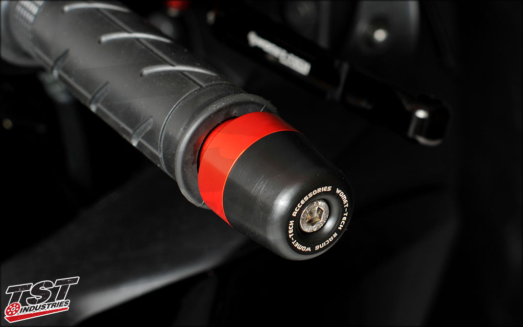 Red anodized bar ends by Womet-Tech.