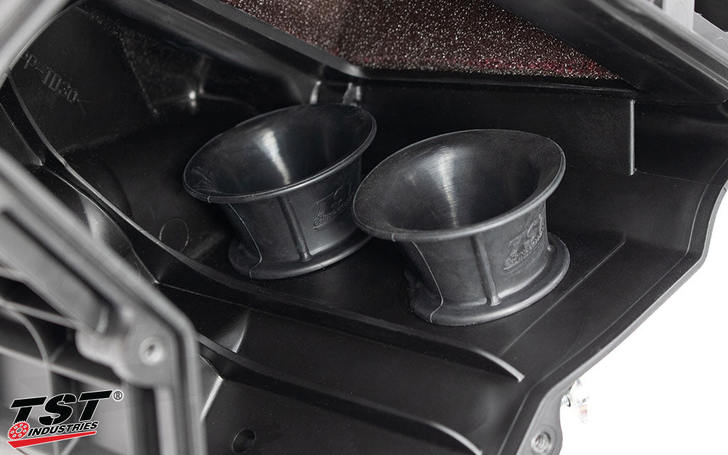 Close up view of the rubber molded TST Industries WORX Velocity Stacks installed within the Yamaha R3 / MT-03 airbox.