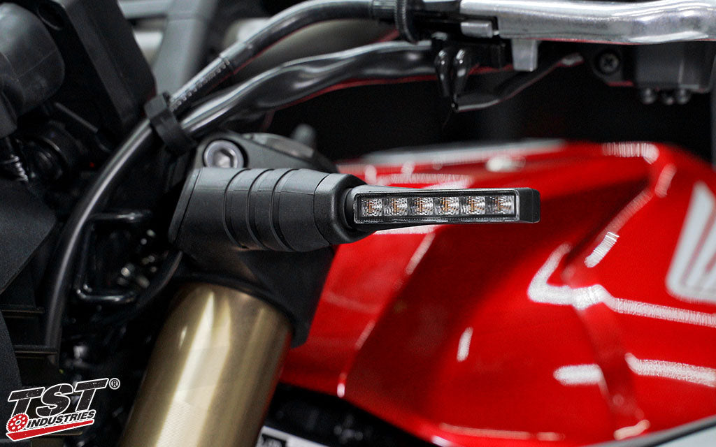 Mount your TST Front Pod Turn Signals with a secure adapter that blends into the CB650R design.
