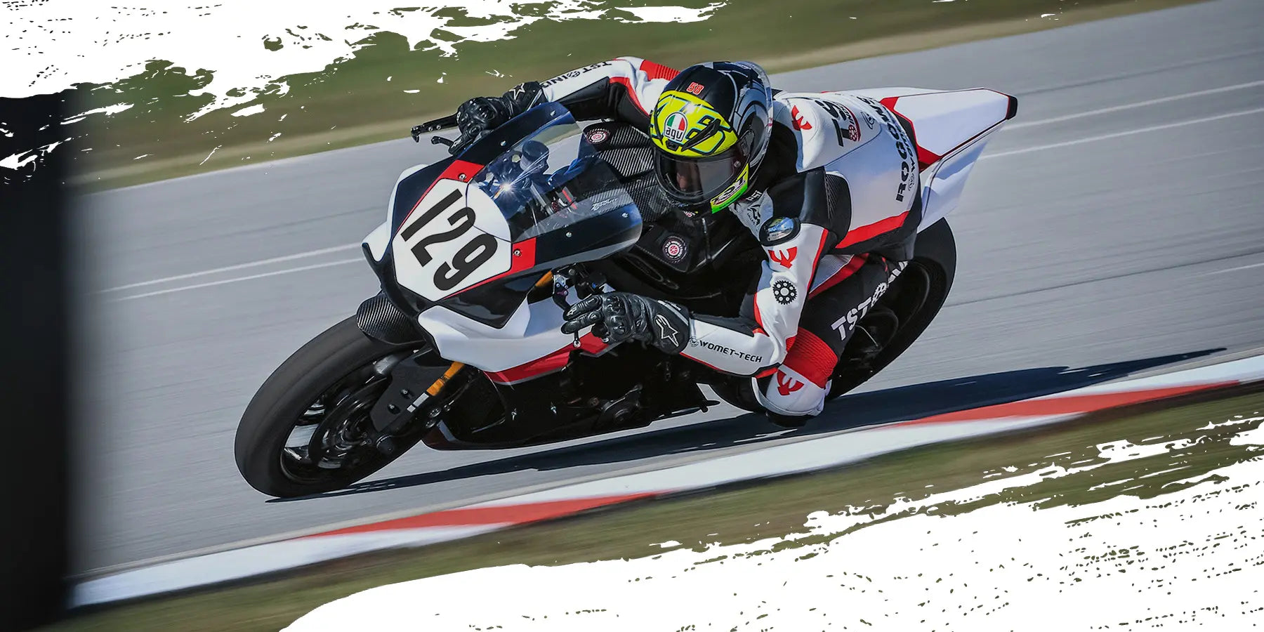 TST Industries racing their Yamaha R1 WORX race bike through a track corner.