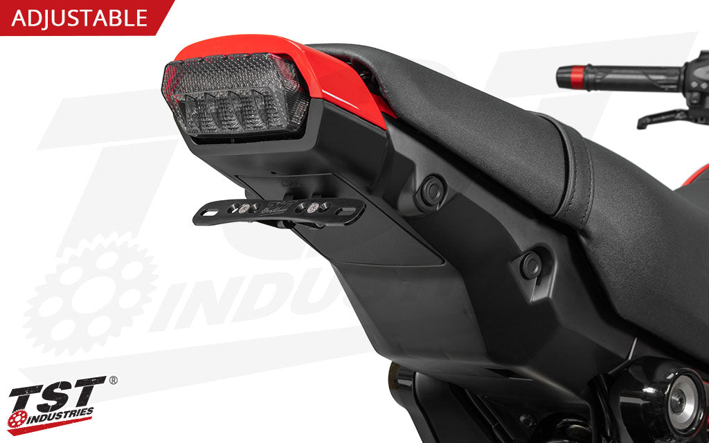 The CNC machined aluminum license plate bracket features a black anodized finish.