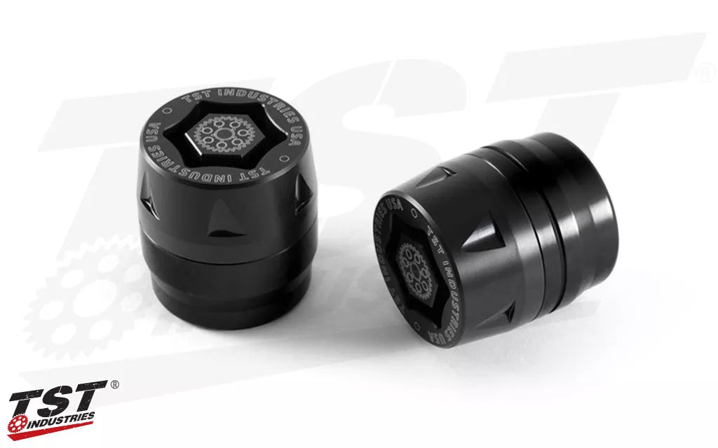 Anodized Black Rear Axle Sliders from TST Industries.