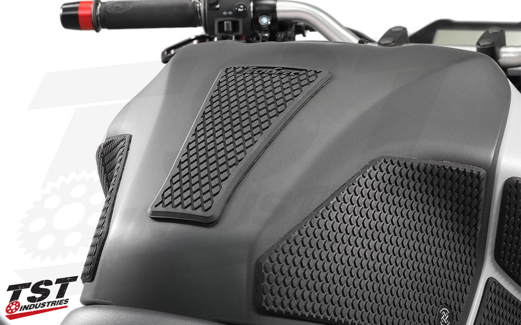 Included center tank protector provides added grip and protects your OEM paint from zippers and buttons.