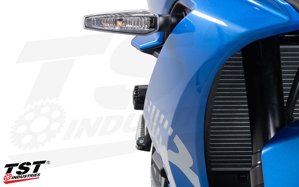 Front angle of the TST Shock Absorbing Frame Sliders installed on a Suzuki GSX-8R.