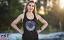 TST Industries Emblem Women's Tank Top, shown in Black. TST Industries Emblem Women's Tank Top, shown in Black.