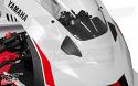 Designed to flow with the existing body lines of the front fairing.