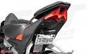 Toss the factory fender and upgrade your Aprilia with a low mount tail tidy kit from TST Industries.