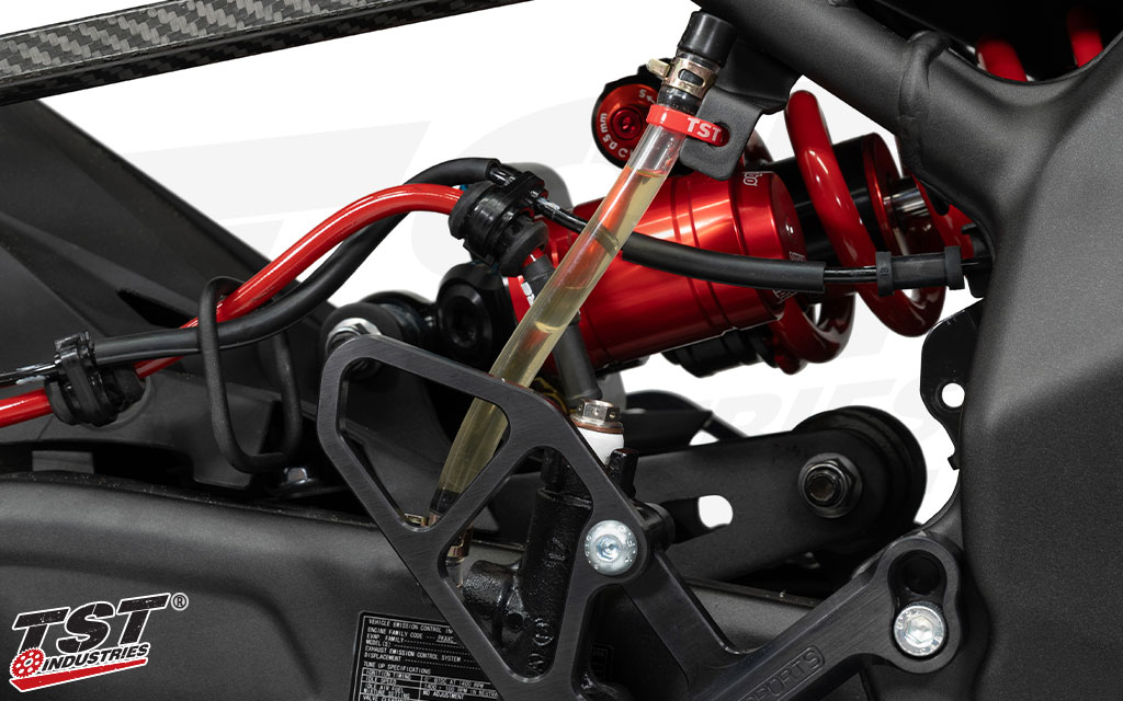 Enables you to get rid of the OEM rear brake reservoir and mounting hardware in favor for a sleek and safe option. 