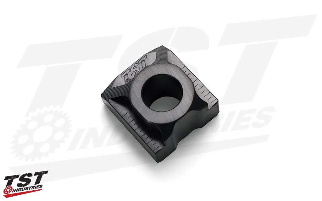 Simply and easily ditch the stock fender with our anodized black CNC machined Axle Block.