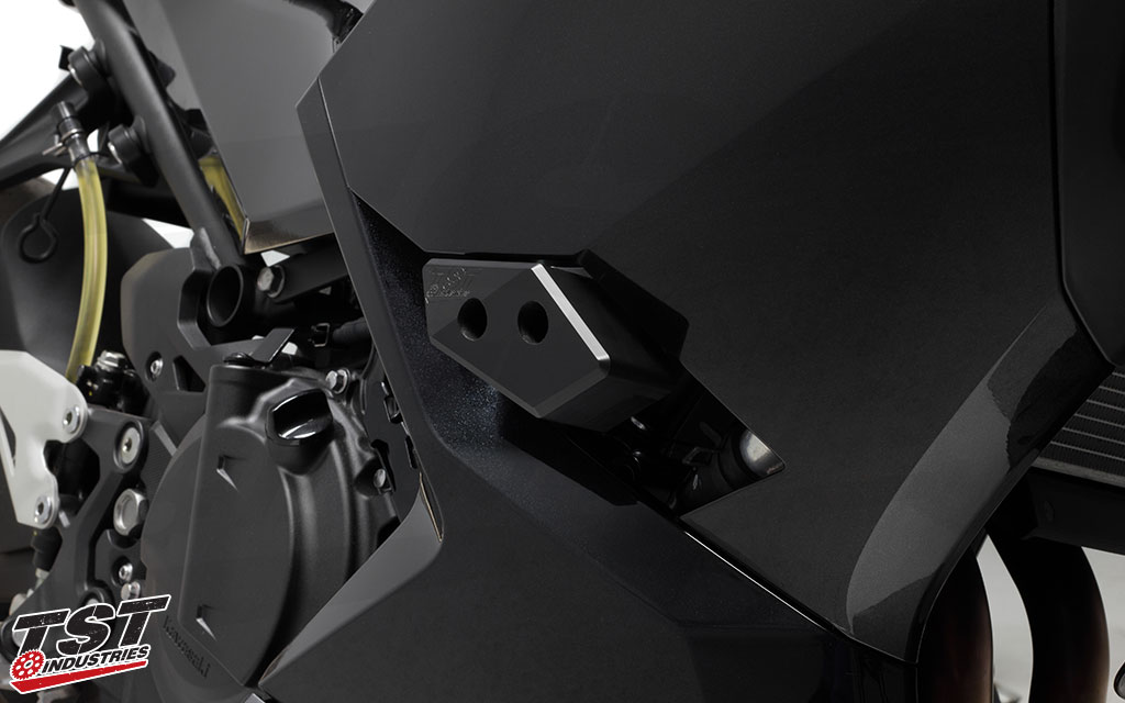 Specifically shaped delrin sliders fit within the fairing gaps for an easy, no-cut installation.