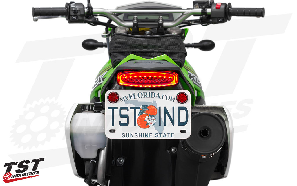 Unique perimeter running light improves the rear styling of the KLX300 / KLX300SM.