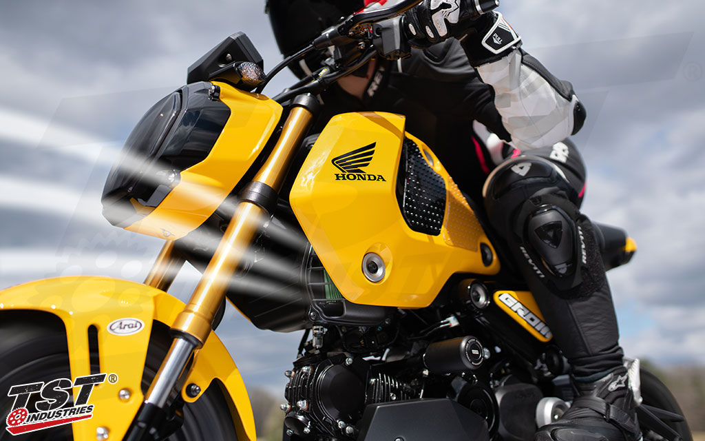 Increase your Grom's airflow, performance, and sound with the TST WORX Airbox Cover.