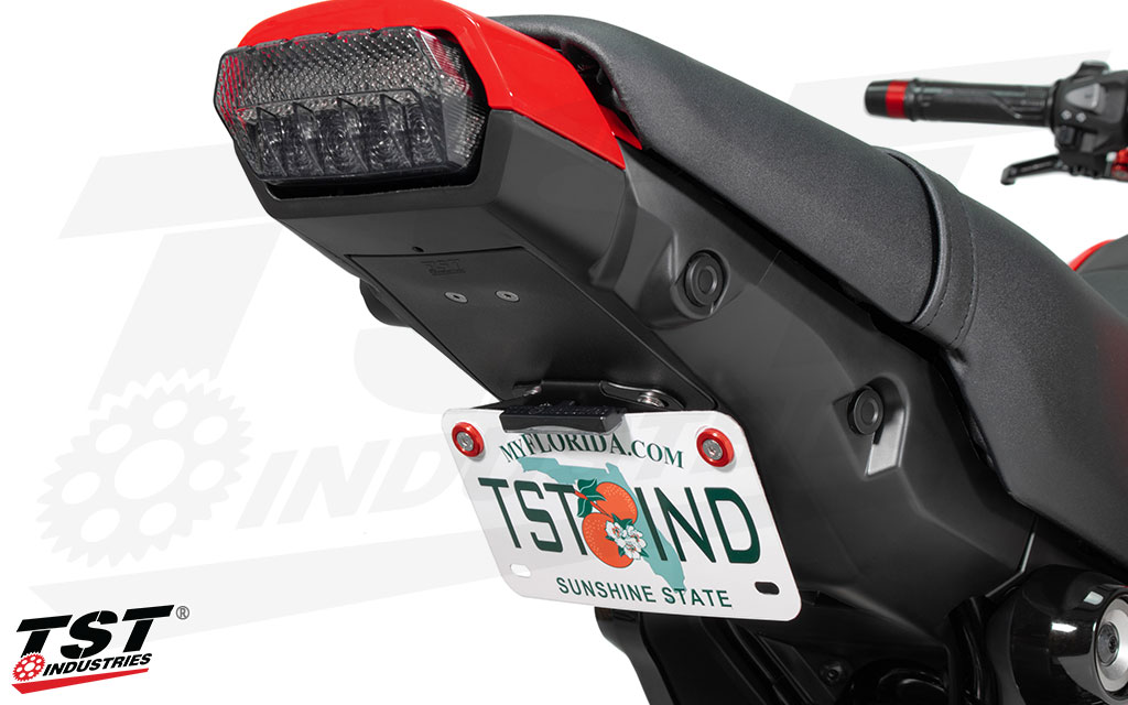 Keep your license plate visible while not hanging it off of the back of the tail of your Grom.