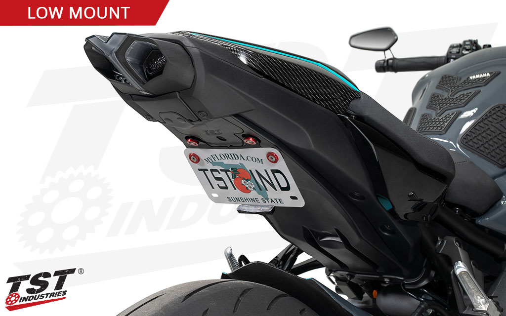 Tuck your license plate in a low position under the seat with the Low-Mount Bracket.