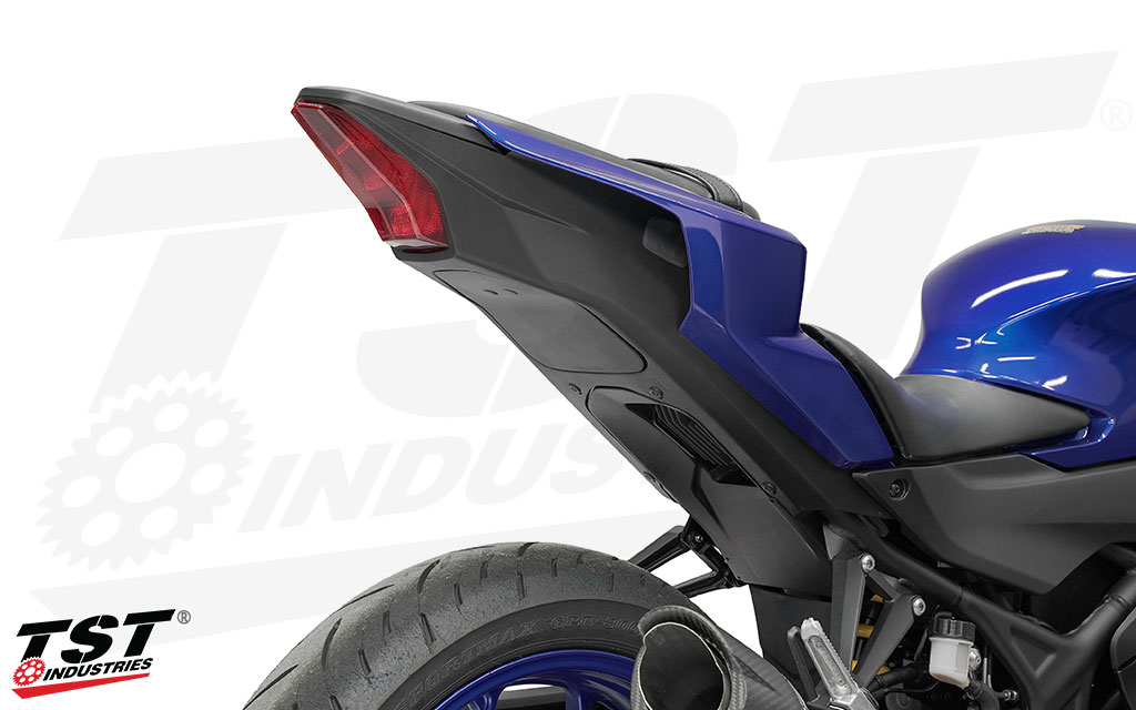 Close out the hole left behind from removing the stock fender with this TST Industries race cover.