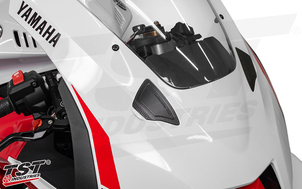 Designed to flow with the existing body lines of the front fairing.