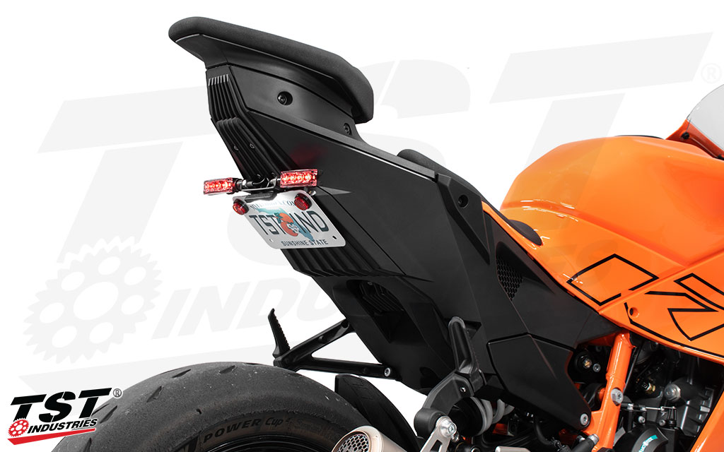 Ditch the KTM factory fender and remount your license plate with the TST Industries tail tidy.