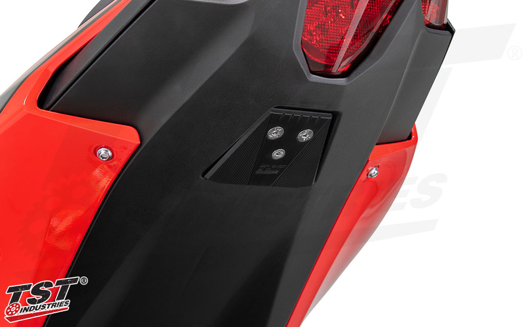 Black anodized aluminum closes off the hole left on your Ninja 500 undertail.