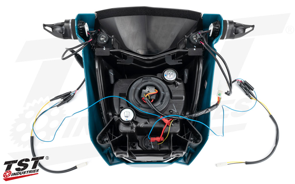 Optional Running Light Kit installs on the 12V switched red wire on the lower headlight bulb with easy to use Positap connectors.