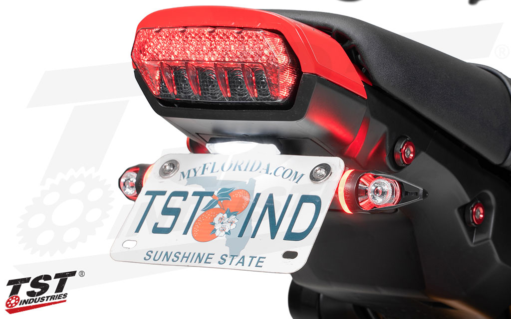 Red running lights illuminate the base of the MECH-EVO LED Turn Signals that are perfect on the rear of your motorcycle.