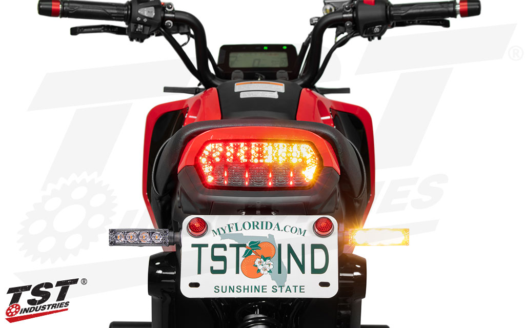 Use an integrated tail light and external turn signals at the same time on your Honda Grom.