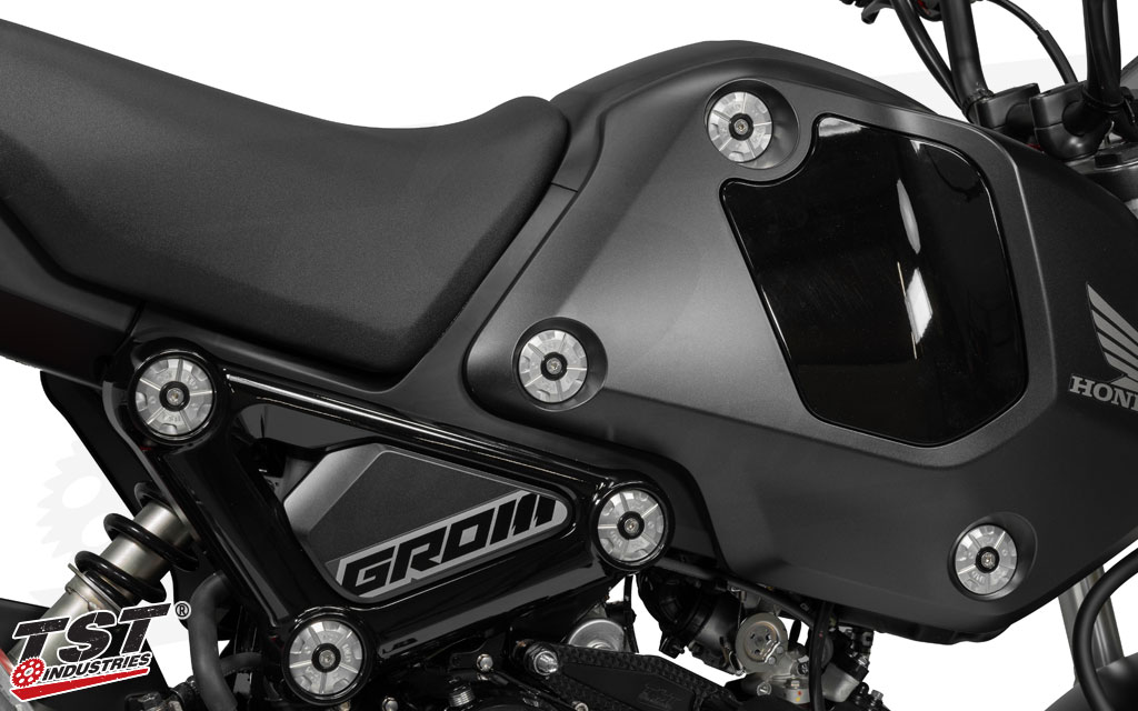 Silver large garnish fairing washers with black inner accent washers shown on the matte black 2022 Grom.