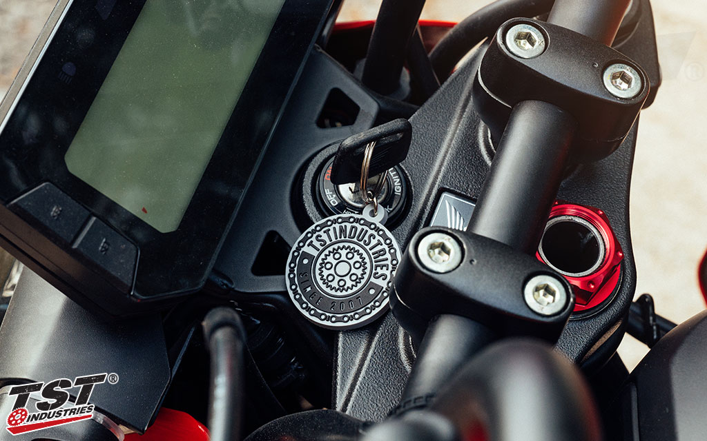Add some TST style to your keys with the Emblem Keychain.