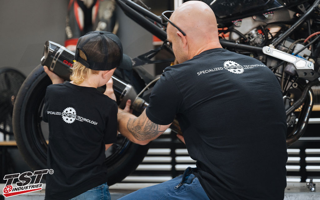 Get your little sidekick the perfect shirt to wear while wrenching on the bike. - Size Small shown.