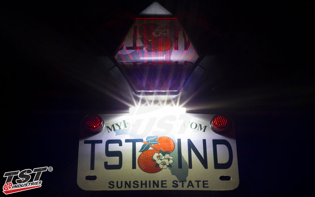 Low-Profile LED License Plate Light at night.